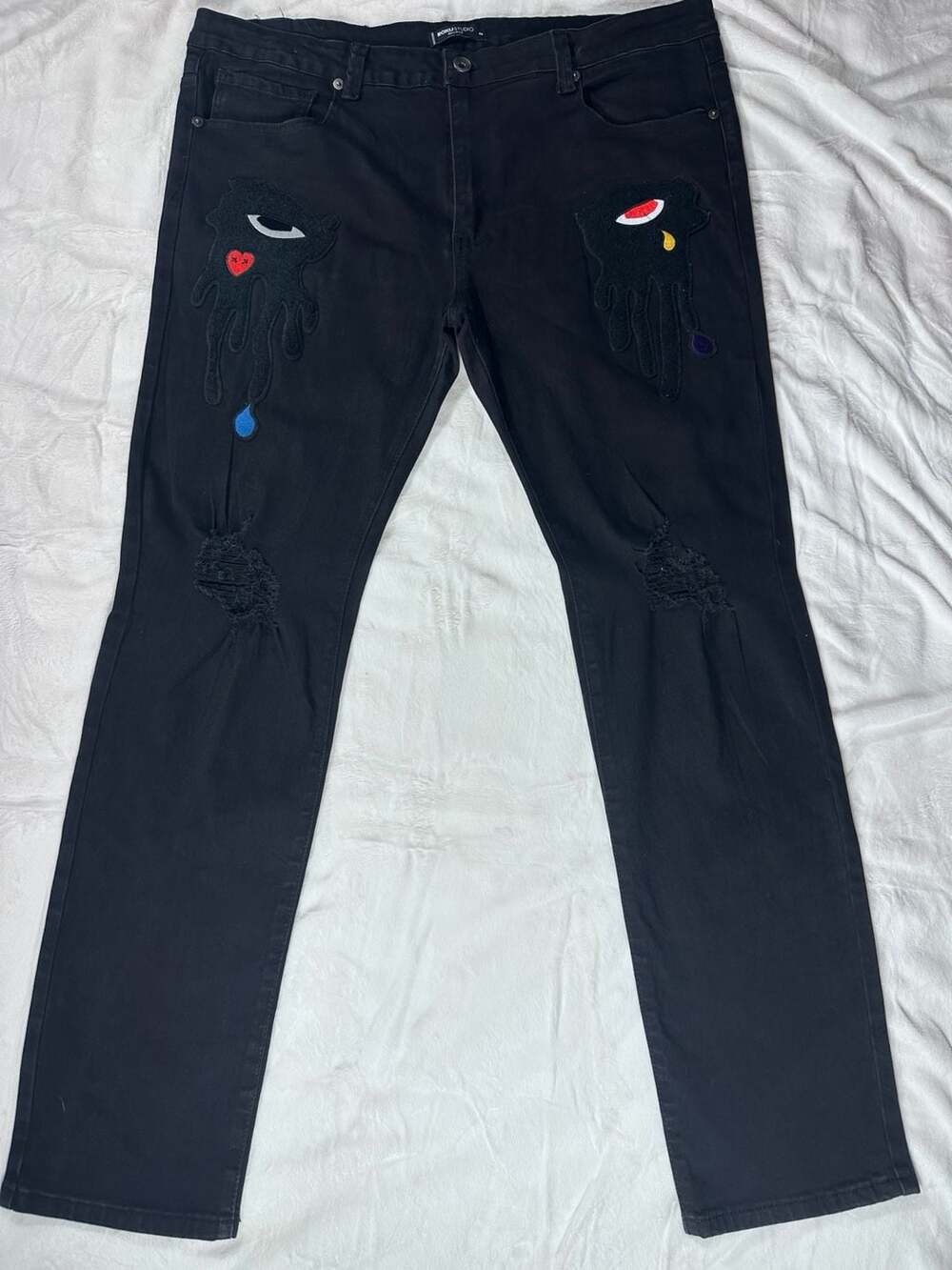 Roku Studio Black Denim Jeans with Crying Eye Dripping Patches and Distressing